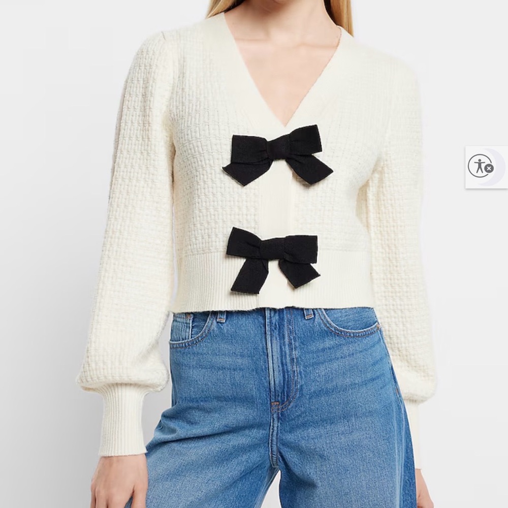 Express Elegant Cream Sweater with Black Bow Accents